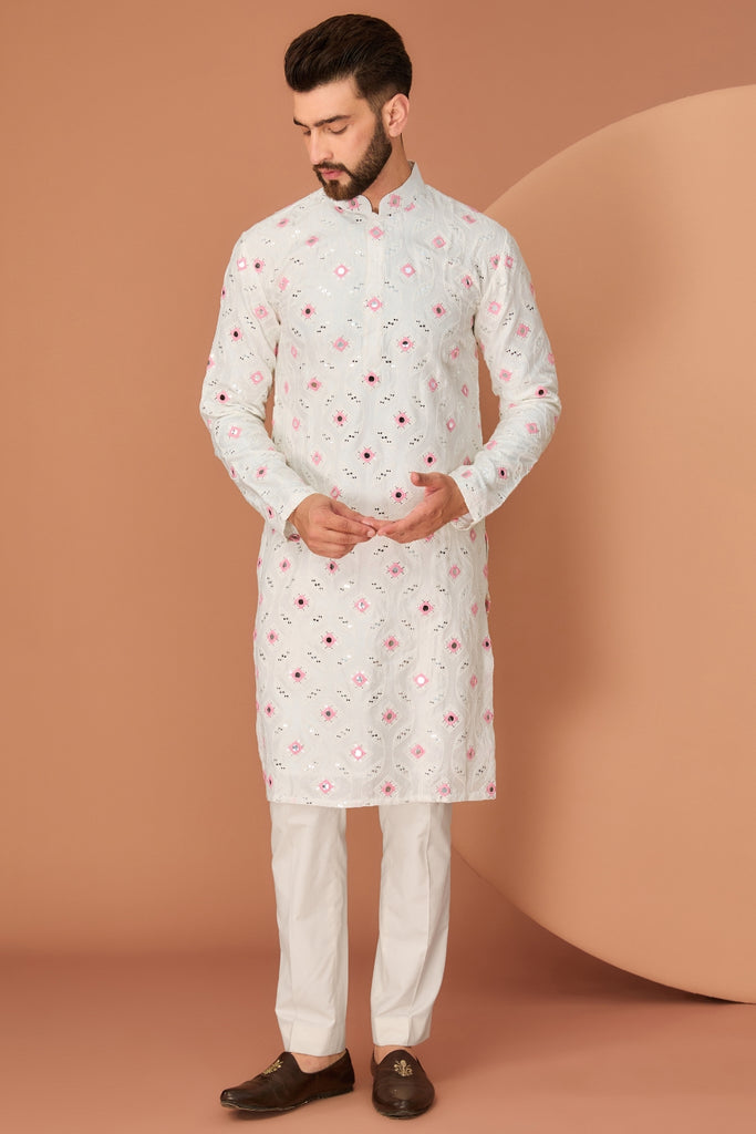 WHITE MIRROR WORK KURTA WITH INTRICATE PINK THREAD DETAILING