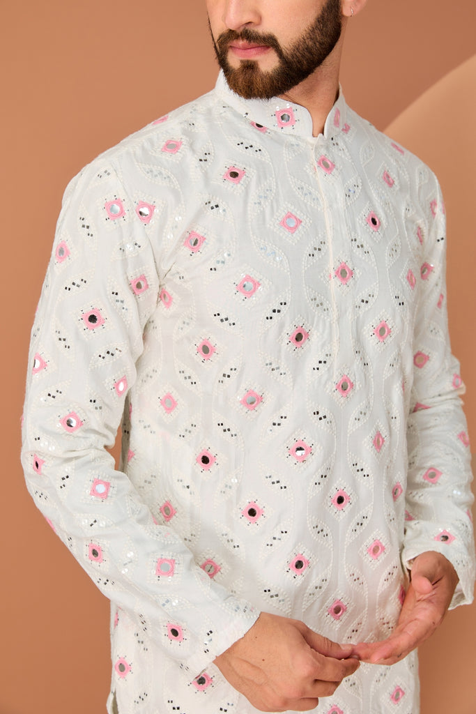 WHITE MIRROR WORK KURTA WITH INTRICATE PINK THREAD DETAILING