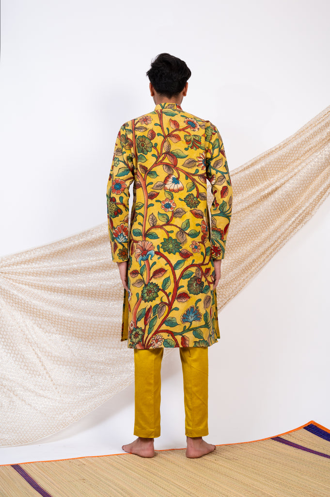 OAKRE-YELLOW HAND-PAINTED FLORAL KALAMKARI KURTA SET.