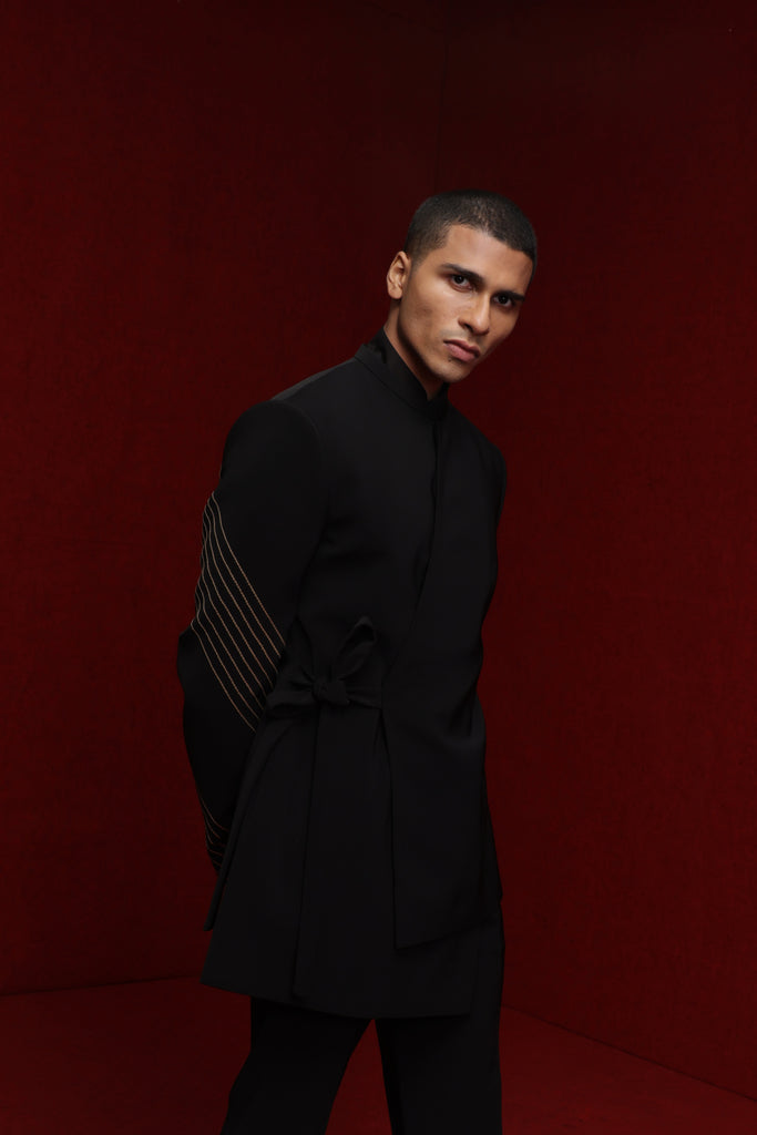 BLACK INDOWESTERN WITH EMBROIDERED SLEEVE LINES AND TIE UP DETAIL PAIRED WITH TONAL KURTA FIITED PANTS