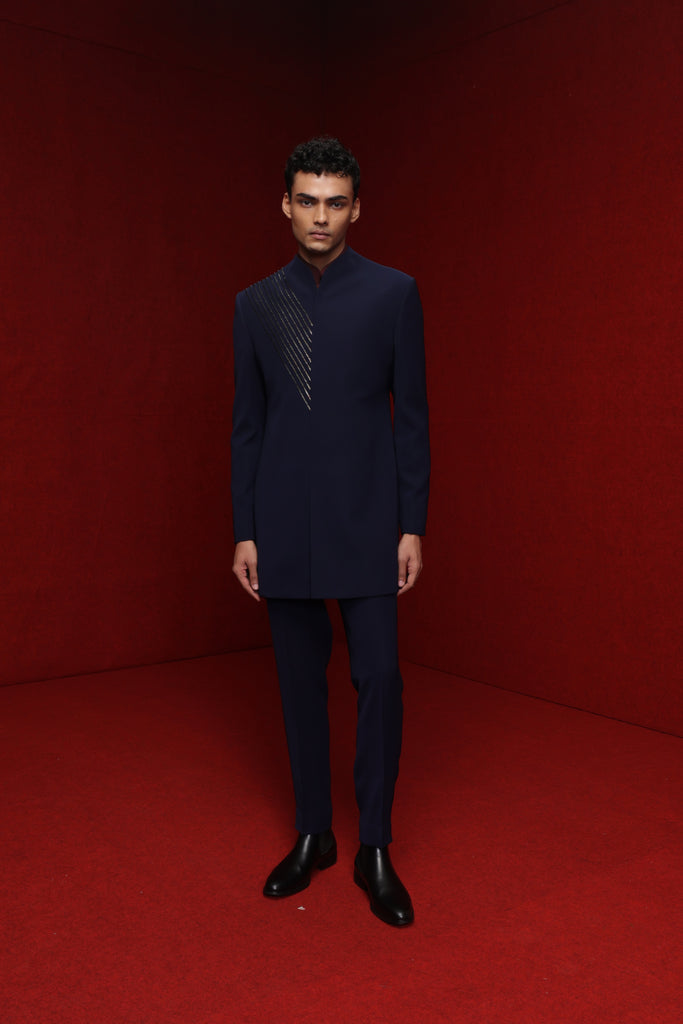 NAVY BLUE INDOWESTERN WITH DIAGONAL DETAIL ON ONE SIDE PAIRED WITH BURGUNDY BROAD STAND KURTA AND NAVY BLUE