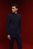 Navy blue asym indowestern with all over motif  paired with burgundy broad stand kurta and navy blue fitted pants