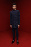 Navy blue indowestern with all over motif paired with tonal fitted pants