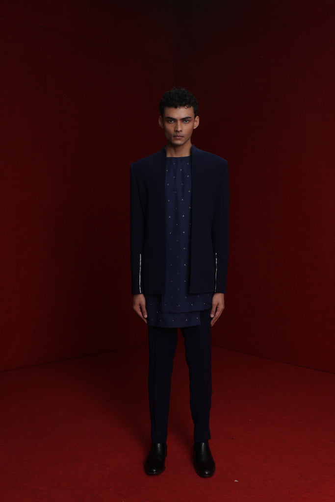 NAVY BLUE INDOWESTERN WITH GOLD DETAIL ON SLEEVES PAIRED WITH TONAL ALL OVER EMB ASYM KURTA AND FITTED PANTS