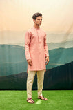 SALMON PINK KURTA SET WITH VERTICAL RED BAND ON BACK
