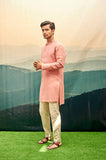 SALMON PINK KURTA SET WITH VERTICAL RED BAND ON BACK