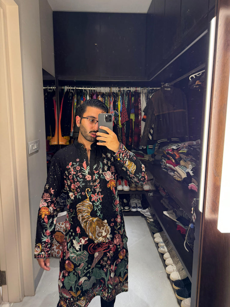 BLACK FLORA-FAUNA EMBROIDERED KURTA WITH INTRICATE MULTI-THREADWORK AND TONE-TO-TONE SEQUINS.