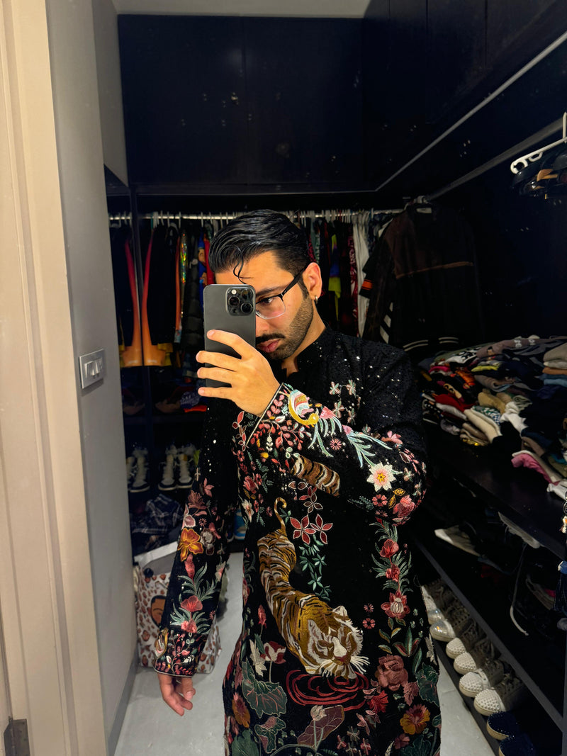 BLACK FLORA-FAUNA EMBROIDERED KURTA WITH INTRICATE MULTI-THREADWORK AND TONE-TO-TONE SEQUINS.