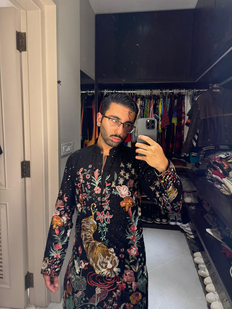 BLACK FLORA-FAUNA EMBROIDERED KURTA WITH INTRICATE MULTI-THREADWORK AND TONE-TO-TONE SEQUINS.