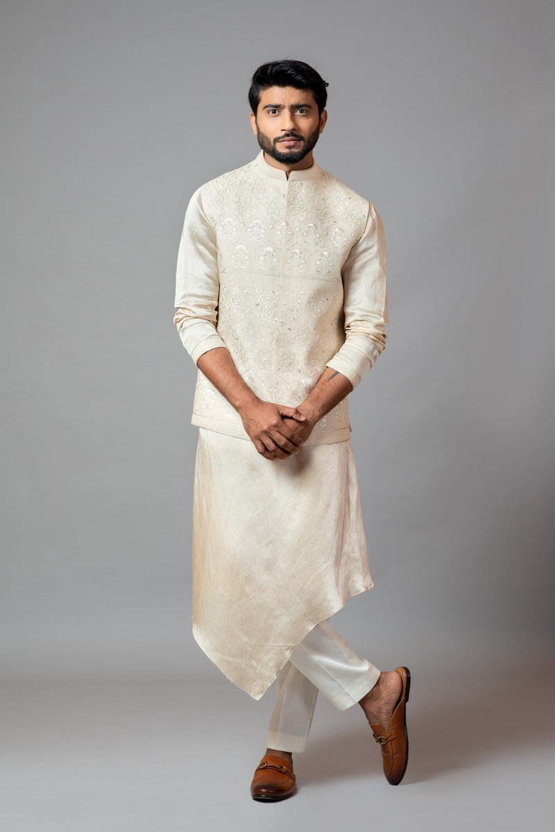 CREAM KORA FULLY EMBROIDERED NEHRU PAIRED WITH DRAPE KURTA AND PANT PAJAMA
