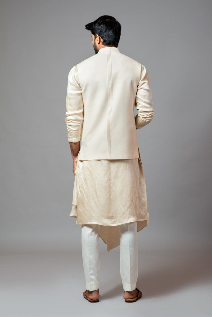 CREAM KORA FULLY EMBROIDERED NEHRU PAIRED WITH DRAPE KURTA AND PANT PAJAMA