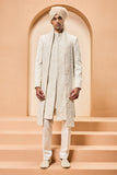 Ivory gold sherwani detailing with zardozi,pearl,sequins and thread work
