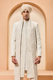 Ivory gold sherwani detailing with zardozi,pearl,sequins and thread work
