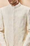 Ivory gold sherwani detailing with zardozi,pearl,sequins and thread work