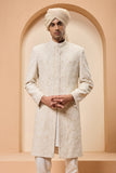 Ivory sherwani detailing with pearl,sequins and thread work