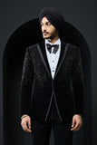 Black tuxedo highlighted with pearls and crystal