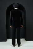 Black tuxedo highlighted with pearls and crystal
