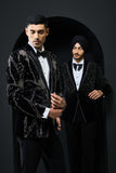 Black tuxedo highlighted with sequins, pearls and cutdana