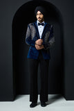 Teal blue tuxedo highlighted with sequins, pearls and cutdana