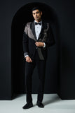 Black tuxedo highlighted with silver zari , cutdana and peals