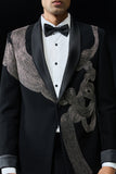 Black tuxedo highlighted with silver zari , cutdana and peals