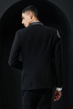 Black tuxedo highlighted with silver zari , cutdana and peals