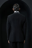 Black tuxedo highlighted with silver zari , cutdana and peals