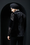 Black tuxedo highlighted with silver zari  and peals