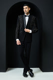 Black tuxedo highlighted with pearls and cutdana