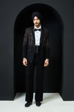 Black tuxedo highlighted with pearls, sequins and thread work