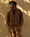 AVINASH TIWARI IN BROWN KNIT JACKET AND BROWN KNIT TROUSER