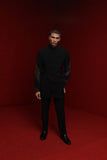 Black indowestern with embroidered sleeve lines and tie up detail paired with tonal kurta fiited pants