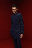 Navy blue indowestern with all over motif paired with tonal fitted pants