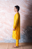 Canary yellow embroidered chanderi kurta paired with yellow churidar