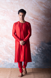 Scarlet red embroidered chanderi kurta paired with red churidar