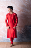 Scarlet red embroidered chanderi kurta paired with red churidar