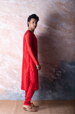 Scarlet red embroidered chanderi kurta paired with red churidar