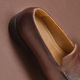 BROWN SIGNATURE SLIP ONS