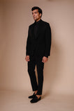 Black shawl lapel tuxedo with gold embroidery across chest