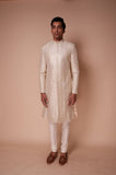 Ivory sherwani with all over embroidered sequin leaf motif