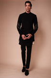 Black sherwani with embroidered sleeve lines and tie up detail