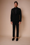 Black shawl lapel tuxedo with gold embroidery across chest