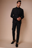 Black suit with inverted embroidered triangle on lapel,flap