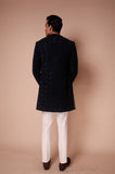 Midnight blue open style sherwani with quard motifs and tonel kurta