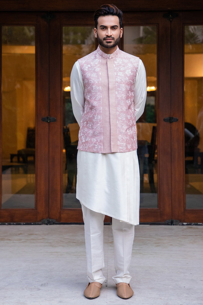Off White Side Cut Pleated Kurta and Churidaar Paired with Onion Pink Embroidered Jacket