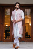 Onion Pink Long Embroidered Jacket with Off White Kurta and Churidaar