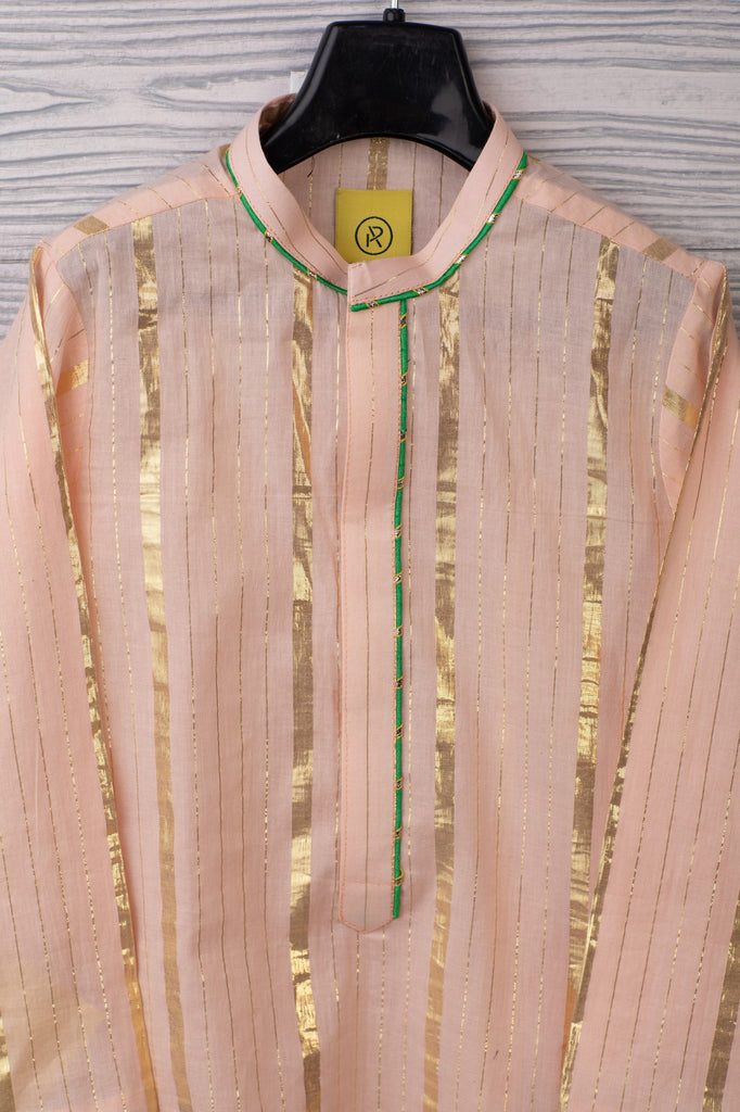 LIGHT PEACH KURTA WITH BOLD GOLDEN LINES AND GREEN DETAILING
