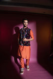 Orange Kurta and pants with multicolour Velvet bandi
